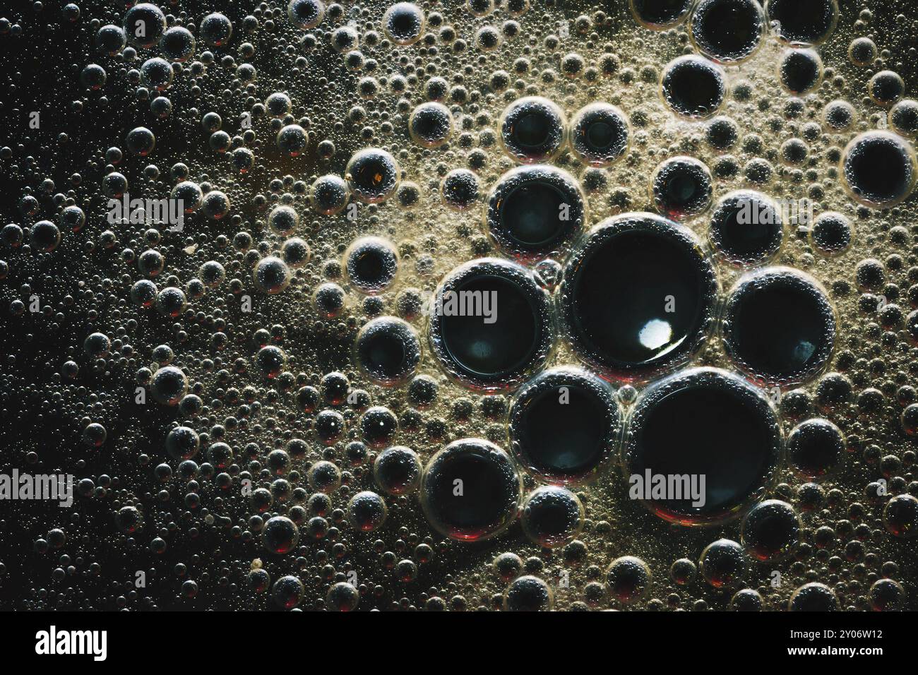Macro oil bubbles abstract light dark background Stock Photo