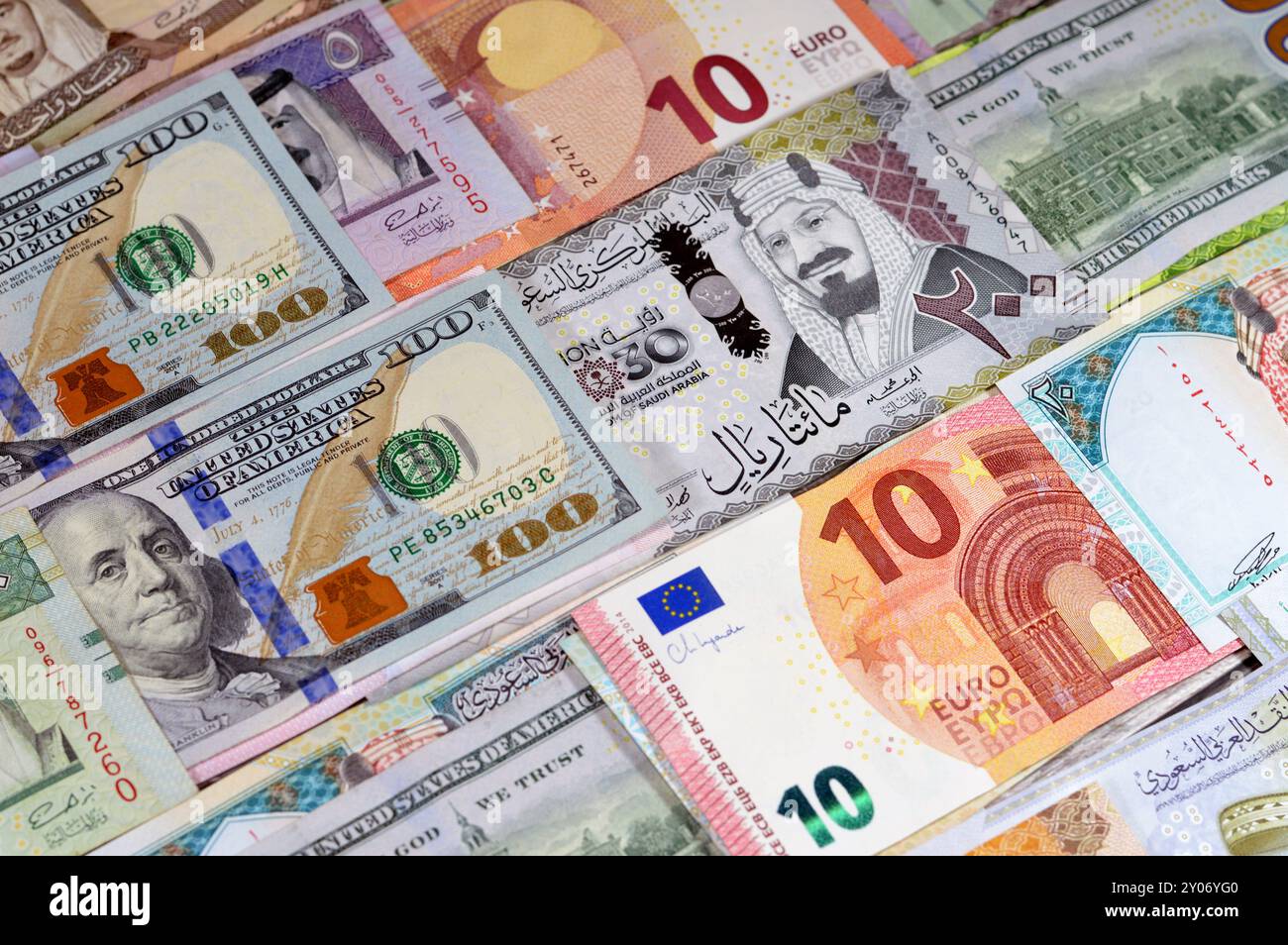 Background of American dollars USD, European Euros EUR banknotes and Saudi  Arabian riyals SAR, money exchange rate, growth, inflation, economy, oil pr  Stock Photo - Alamy