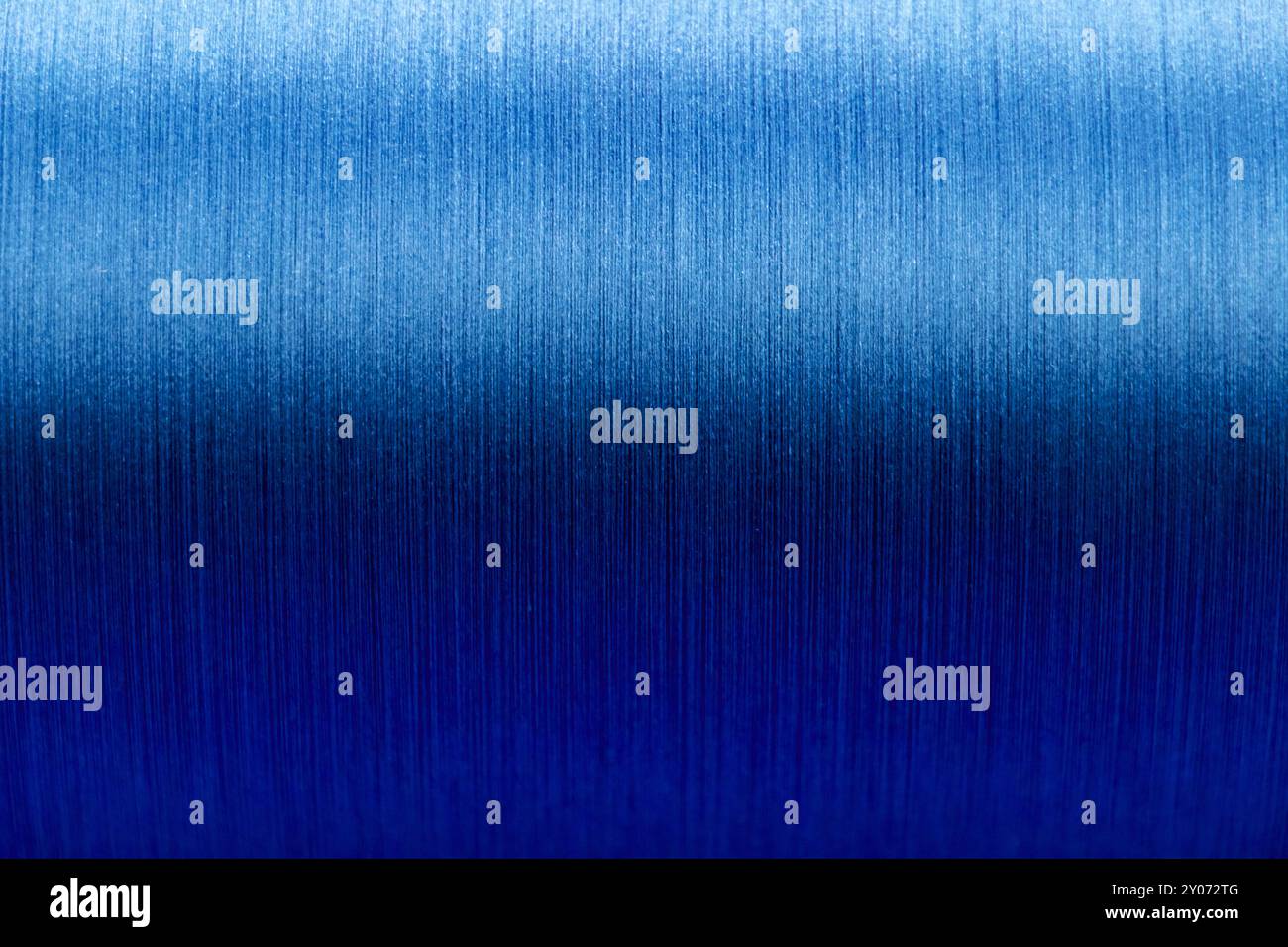 Closed up of blue color of thread textured background (Focus at center ...