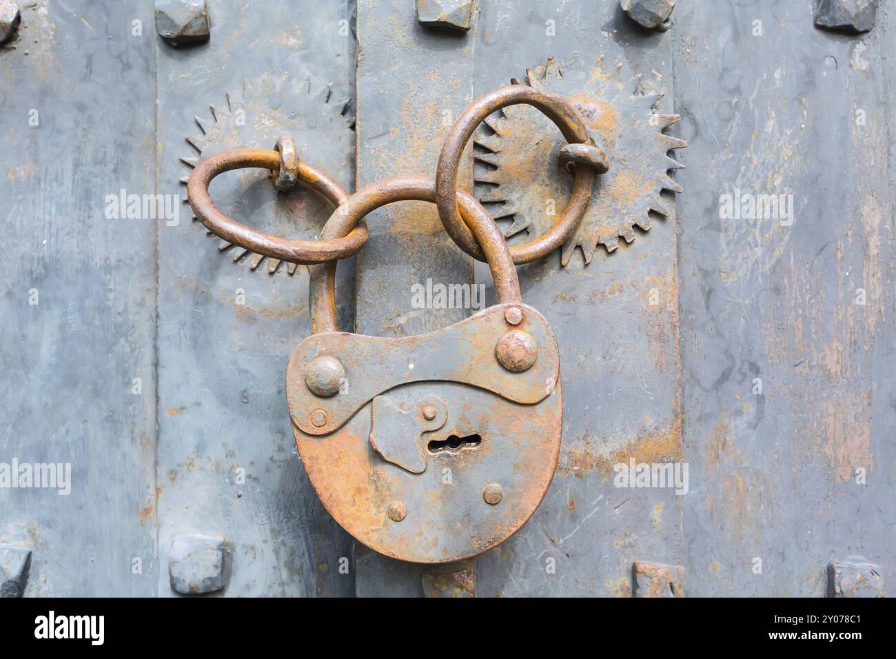 Old rusty padlock on wooden door background with copyspace Stock Photo ...
