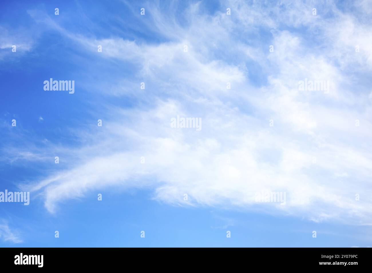 Vibrant vacation summer background with white fluffy clouds in the blue ...