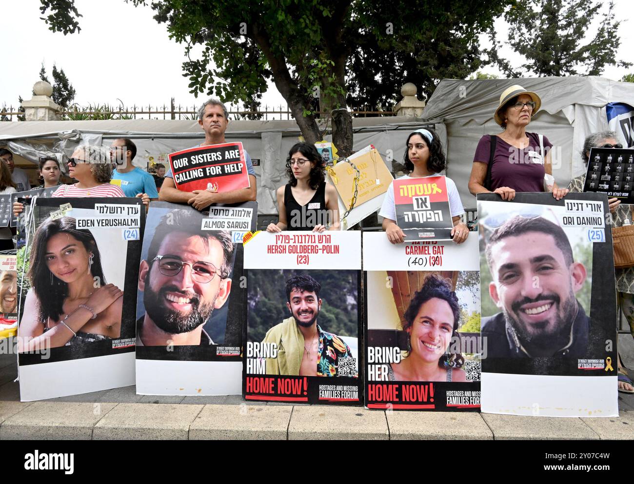 Jerusalem, Israel. 01st Sep, 2024. People hold posters with photos of ...