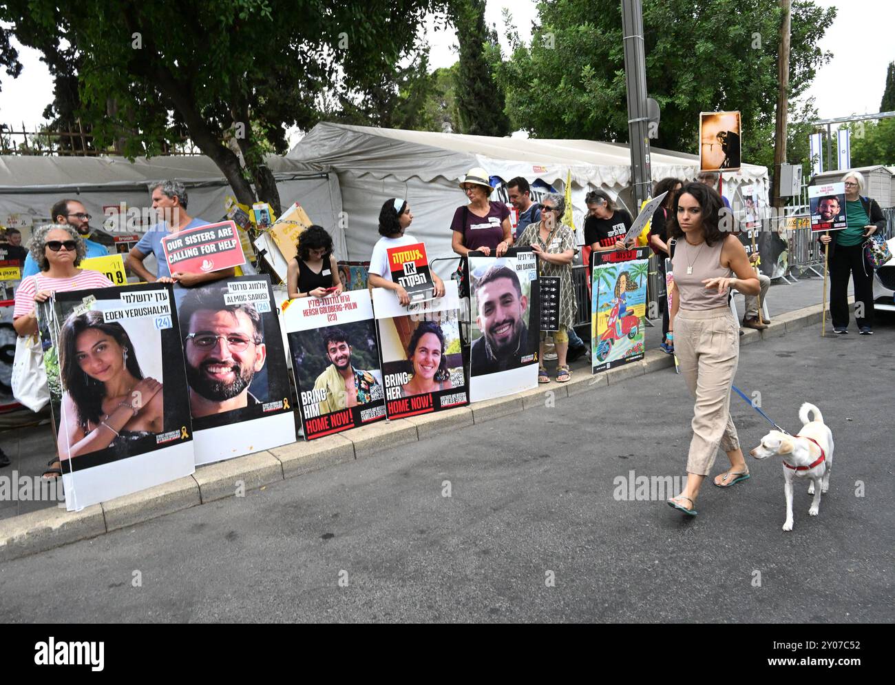 Jerusalem, Israel. 01st Sep, 2024. People hold posters with photos of ...