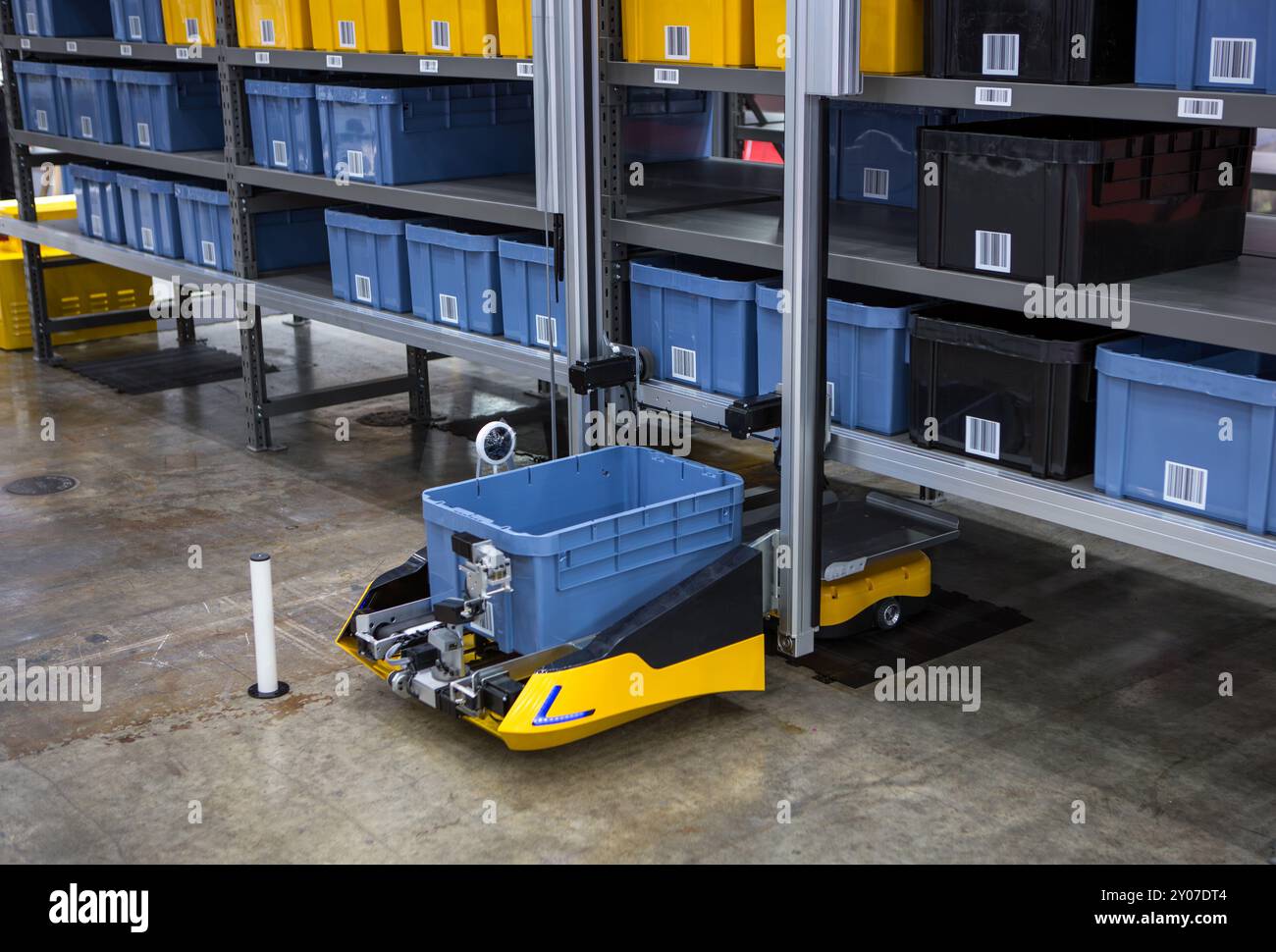Autonomous robot picking materials from multi-layer rack in modern ...