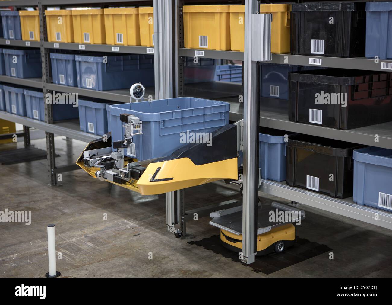 Autonomous robot picking materials from multi-layer rack in modern ...