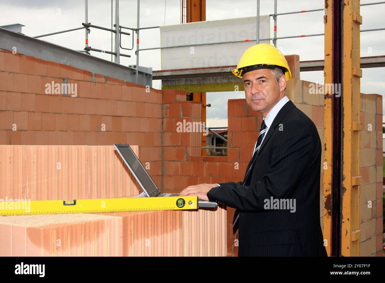 Architect on the building site Stock Photo - Alamy