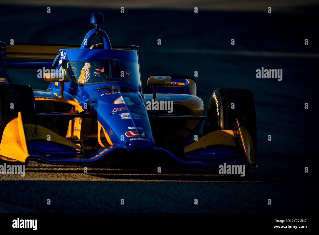 West Allis, Wi, USA. 31st Aug, 2024. As the sun starts to set, NTT INDYCAR SERIES driver, KYFFIN SIMPSON (R) (4) (BRB) of Bridgetown, Barbados races through the turns during the Hy-Vee Milwaukee Mile 250's at The Milwaukee Mile in West Allis, WI. (Credit Image: © Walter G. Arce Sr./ASP via ZUMA Press Wire) EDITORIAL USAGE ONLY! Not for Commercial USAGE! Stock Photo