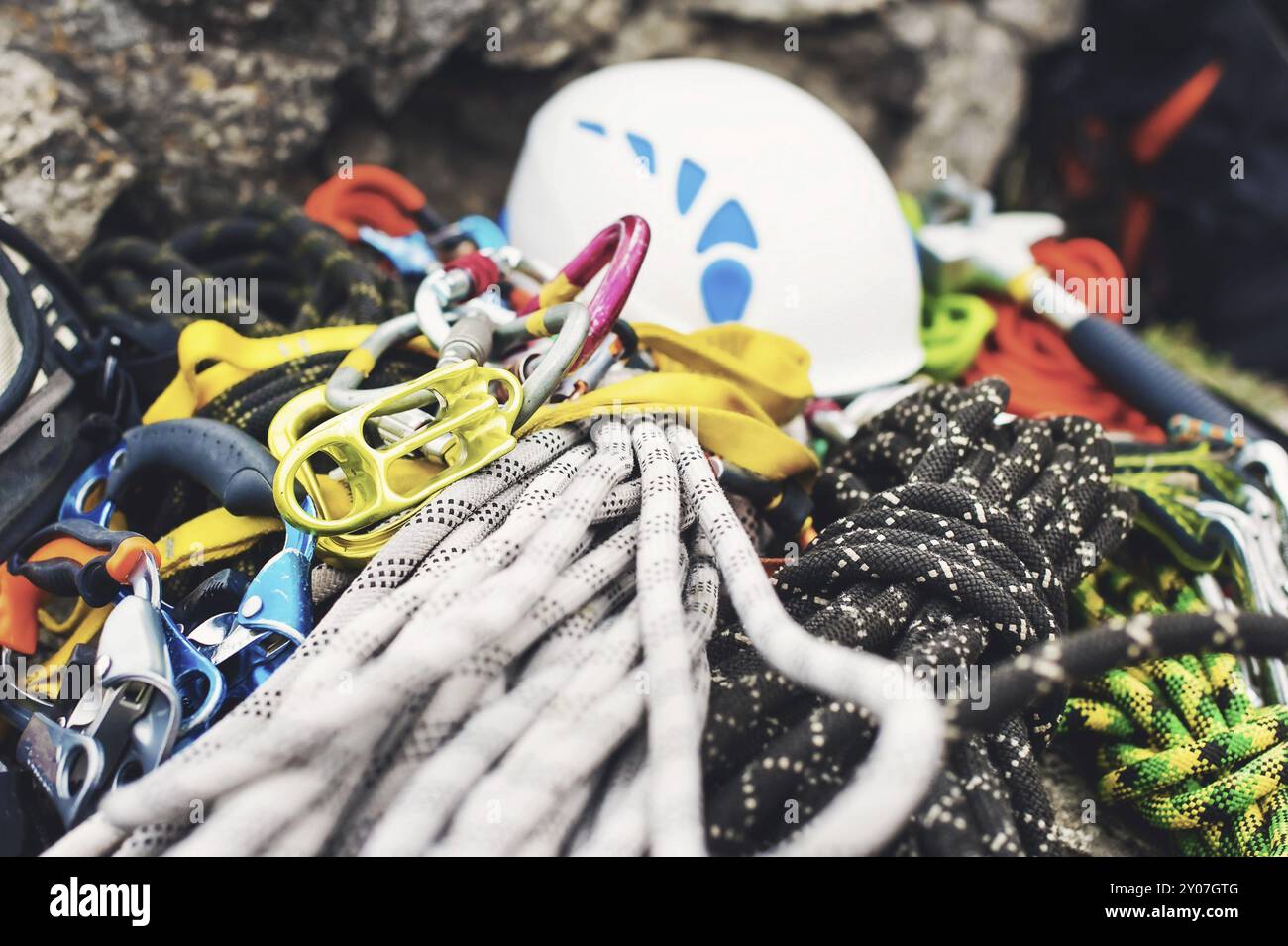 Used climbing equipment, carabiner without scratches, climbing hammer ...