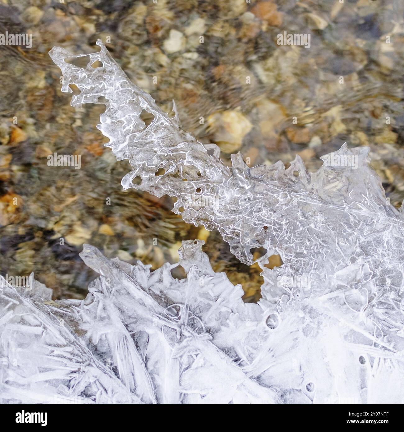Ice crystals and peaks on the brook Stock Photo - Alamy
