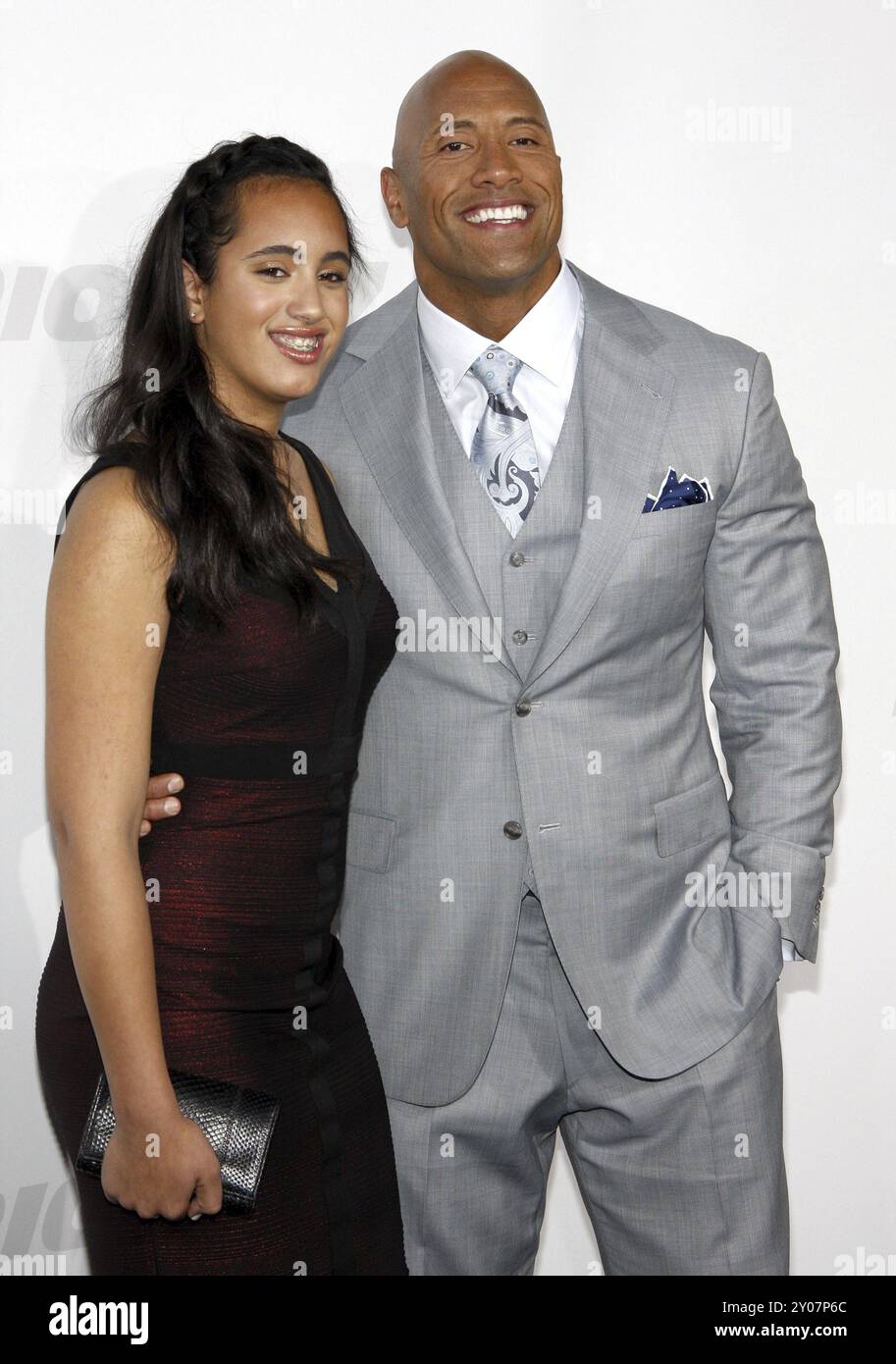 Dwayne Johnson and Simone Alexandra Johnson at the Los Angeles premiere of 'Furious 7' held at the TCL Chinese Theatre IMAX in Hollywood, USA on April Stock Photo