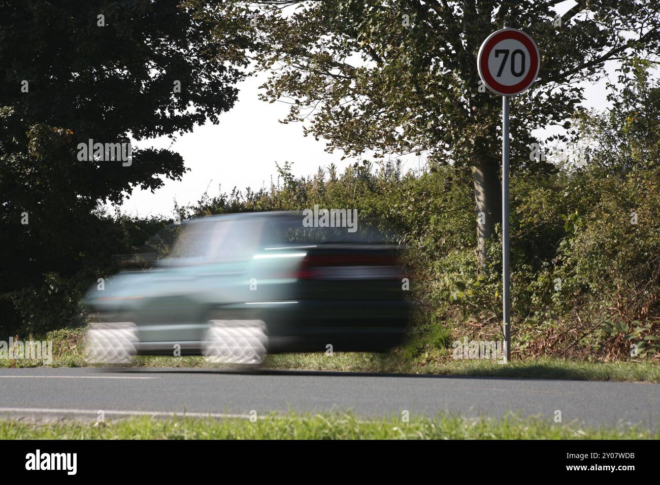 Speeding in front of a 70 km/h sign Stock Photo - Alamy