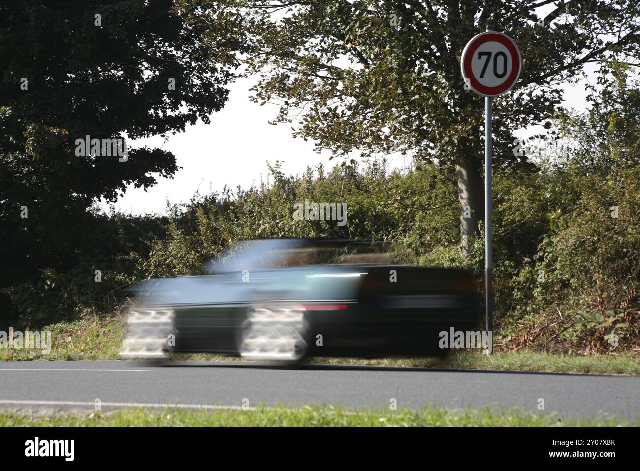 Speeding in front of a 70 km/h sign Stock Photo - Alamy