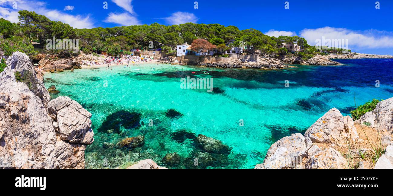 Best scenic beaches of Mallorca (Majorca) Balearic island - beautiful Cala Gat with amazing turquoise crystal sea . Spain summer holidyas Stock Photo