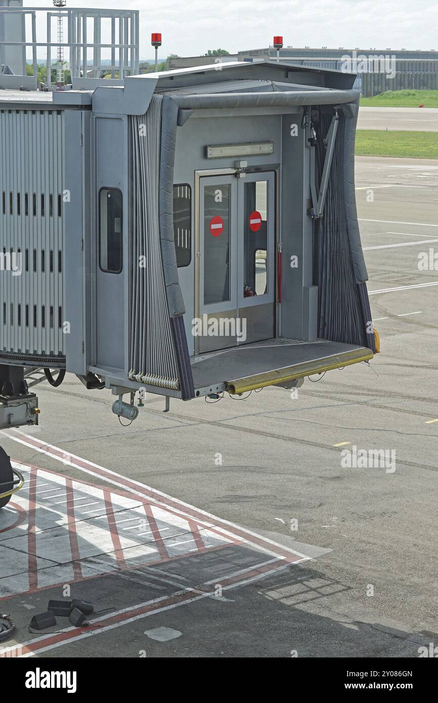 Movable skybridge passenger boarding bridge at airport Stock Photo - Alamy