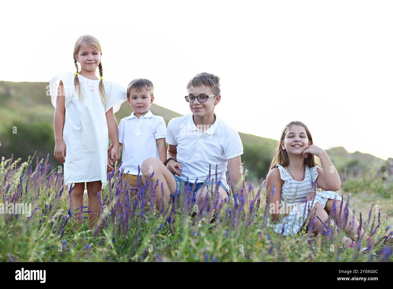 Portrait of the kids playing on the summer medow Stock Photo