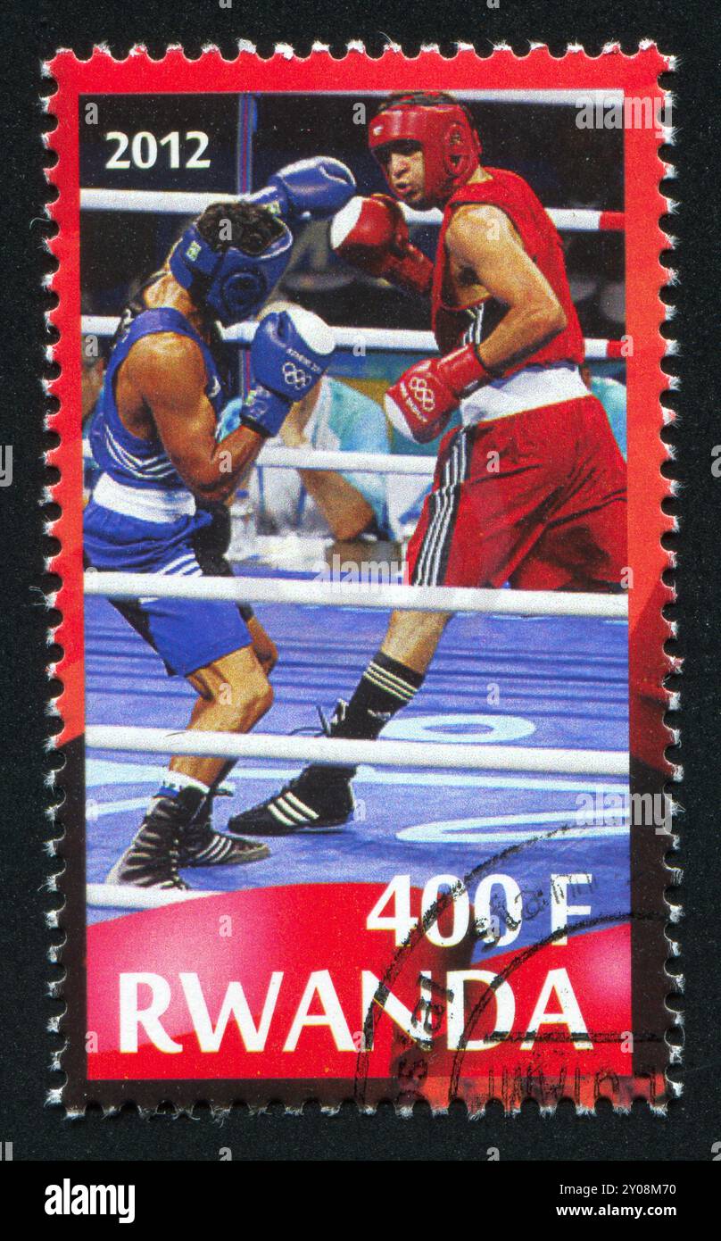RWANDA - CIRCA 2012: stamp printed by Rwanda, shows boxing, circa 2012 ...