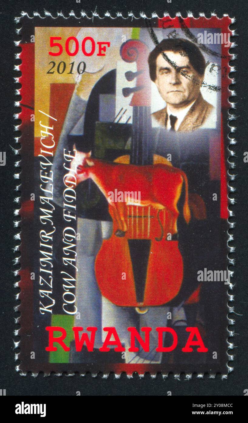 RWANDA - CIRCA 2010: stamp printed by Rwanda, shows Cow and Fiddle by ...