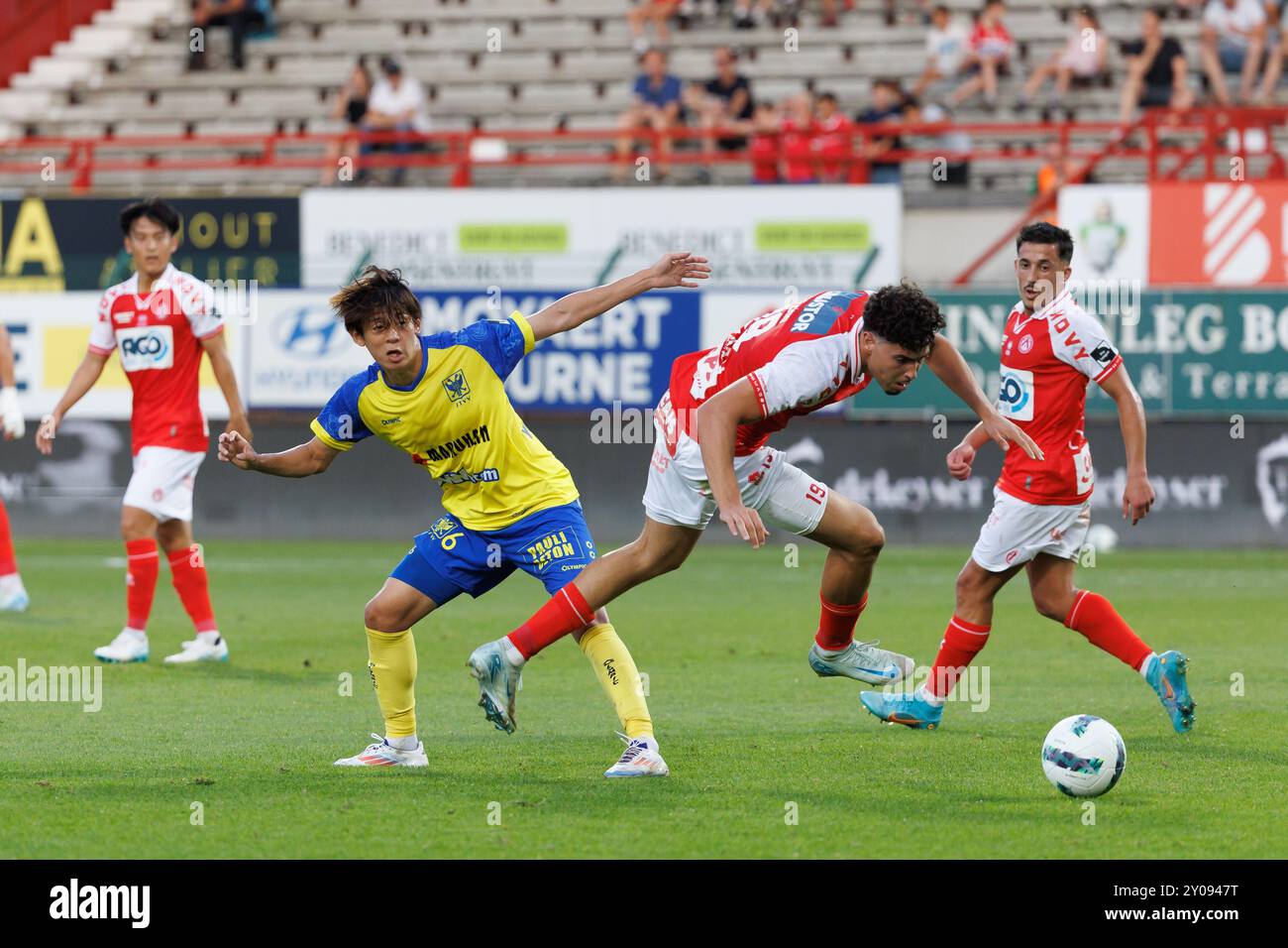 Kortrijk, Belgium. 01st Sep, 2024. STVV's Rihito Yamamoto and Kortrijk's Nacho Ferri fight for the ball during a soccer match between KV Kortrijk and Sint-Truiden VV, Sunday 01 September 2024 in Kortrijk, on the sixth day of the 2024-2025 season of the 'Jupiler Pro League' first division of the Belgian championship. BELGA PHOTO KURT DESPLENTER Credit: Belga News Agency/Alamy Live News Stock Photo