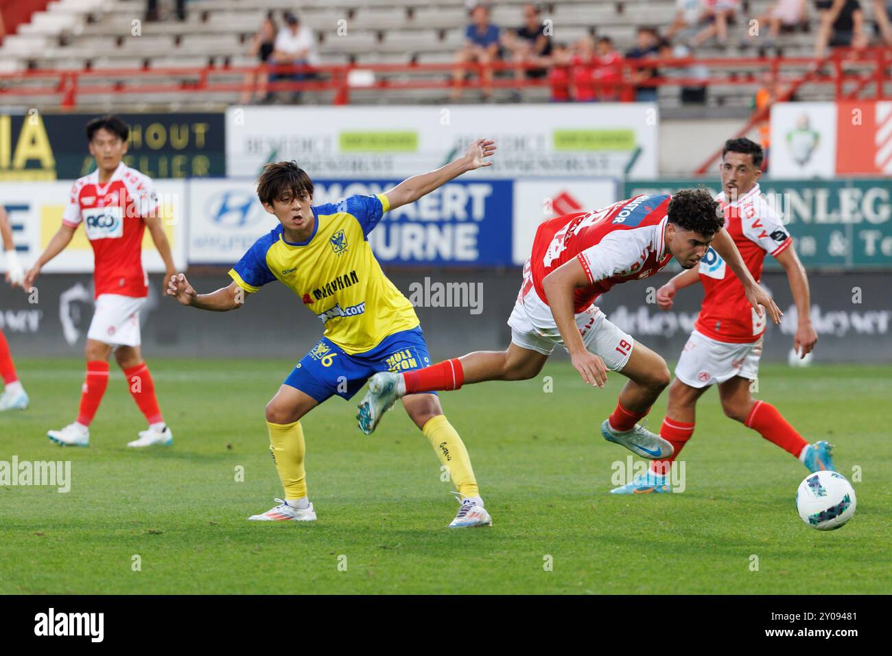 Kortrijk, Belgium. 01st Sep, 2024. STVV's Rihito Yamamoto and Kortrijk's Nacho Ferri fight for the ball during a soccer match between KV Kortrijk and Sint-Truiden VV, Sunday 01 September 2024 in Kortrijk, on the sixth day of the 2024-2025 season of the 'Jupiler Pro League' first division of the Belgian championship. BELGA PHOTO KURT DESPLENTER Credit: Belga News Agency/Alamy Live News Stock Photo