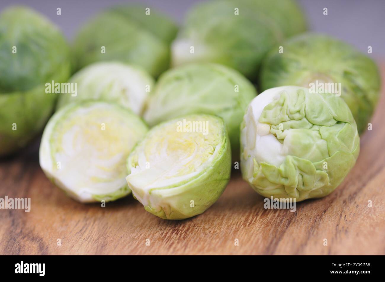 Fresh brussels sprouts on a wooden board Stock Photo