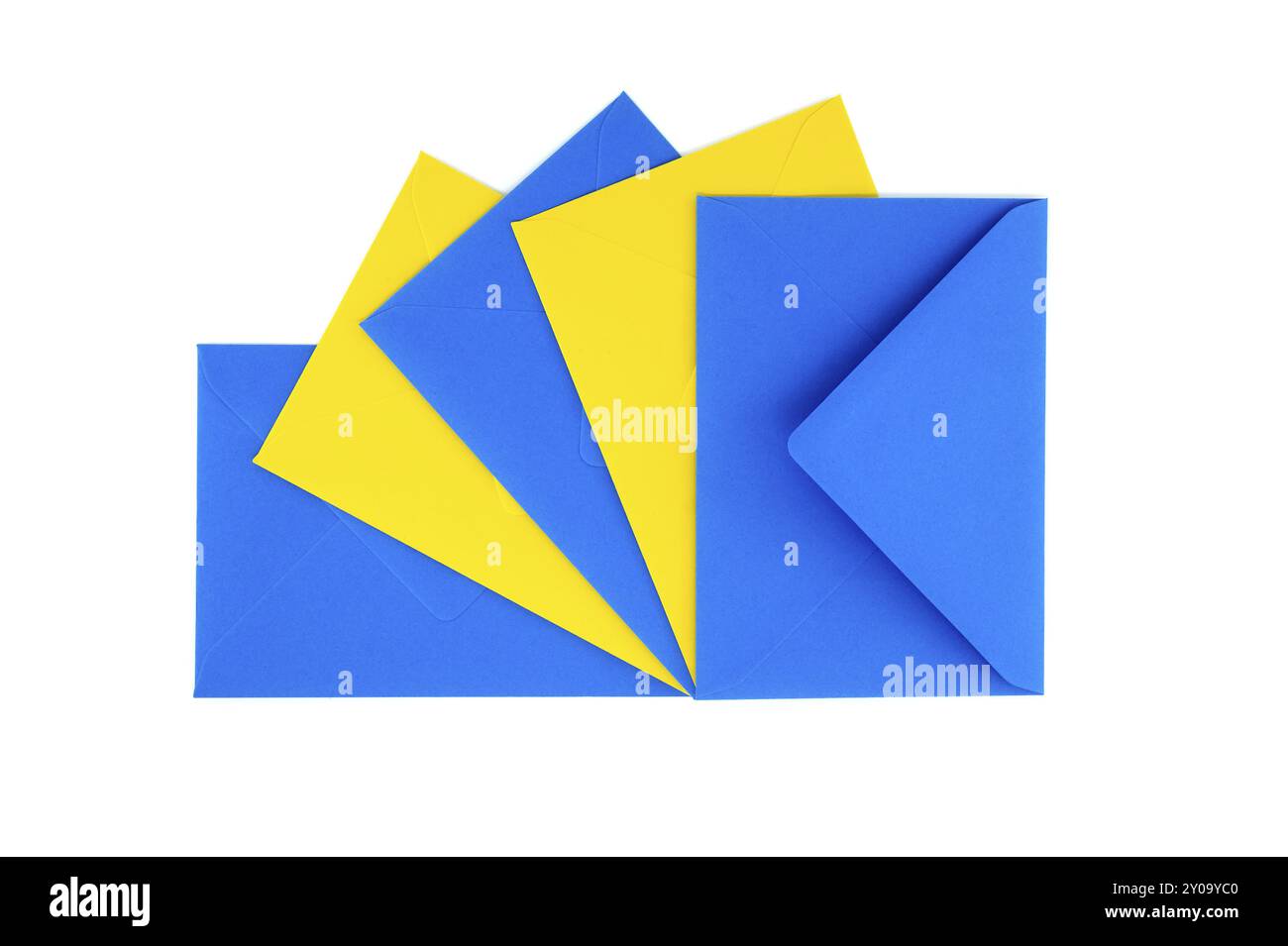 Collection of blue and yellow paper envelopes arranged against a white ...