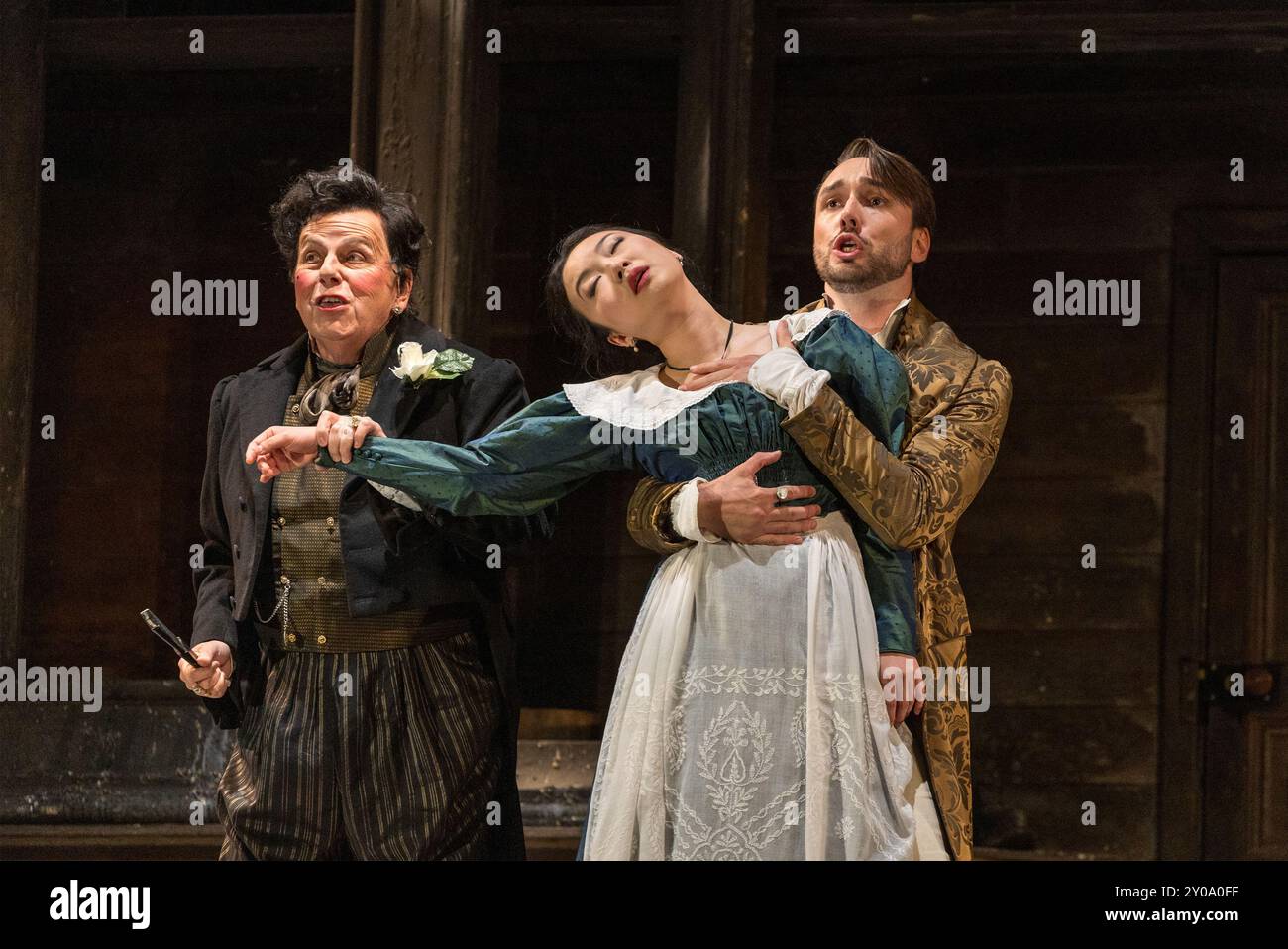 l-r: Adrian Thompson (Don Basilio), Ying Fang (Susanna), Huw Montague Rendall (Count Almaviva) in LE NOZZE DI FIGARO at The Royal Opera, Covent Garden Stock Photo