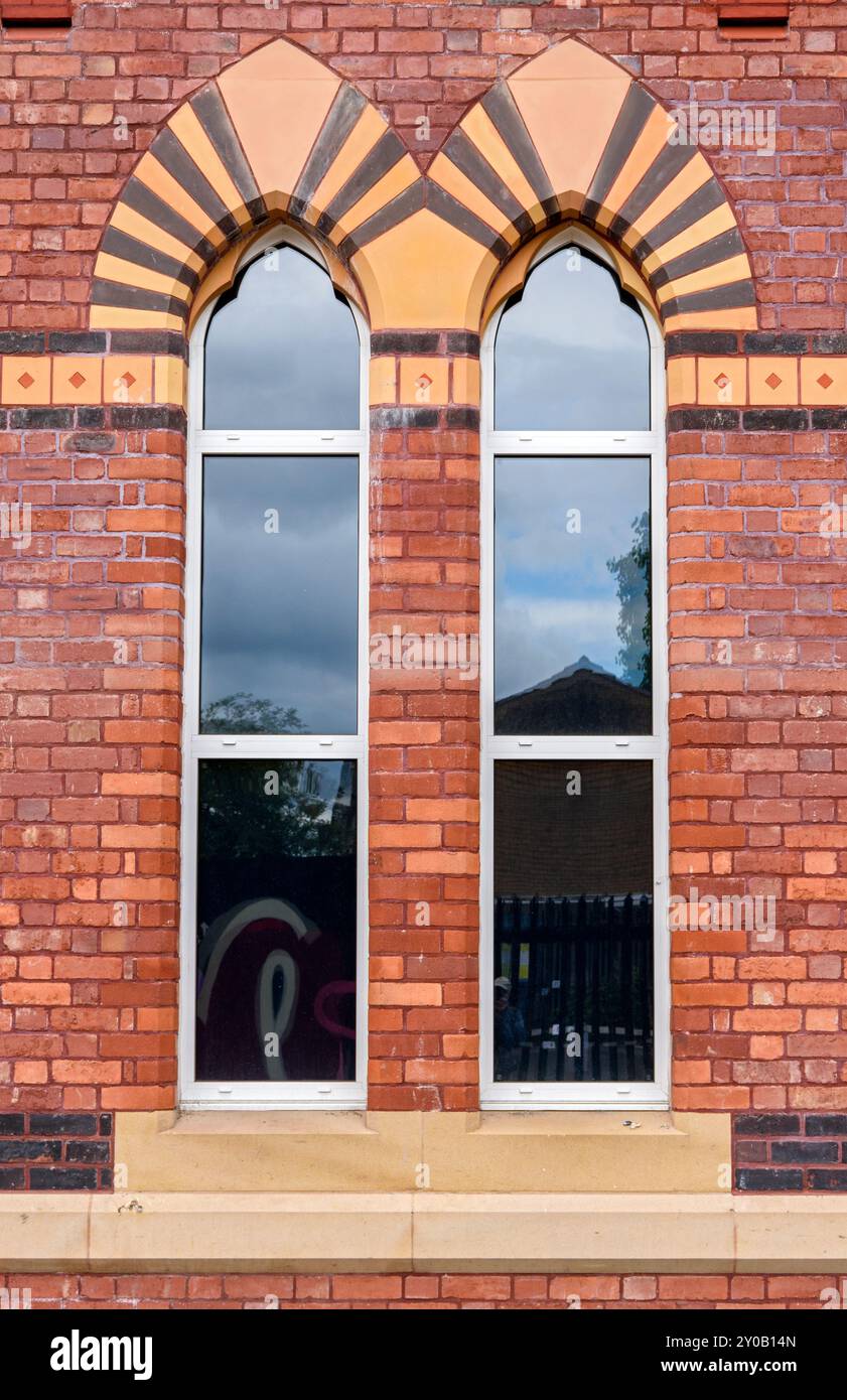 Window on the Ancoats Hospital and Dispensary building, Daniel Lewis  1872-74. Ancoats, Manchester,  UK.  Now converted to apartments. Stock Photo