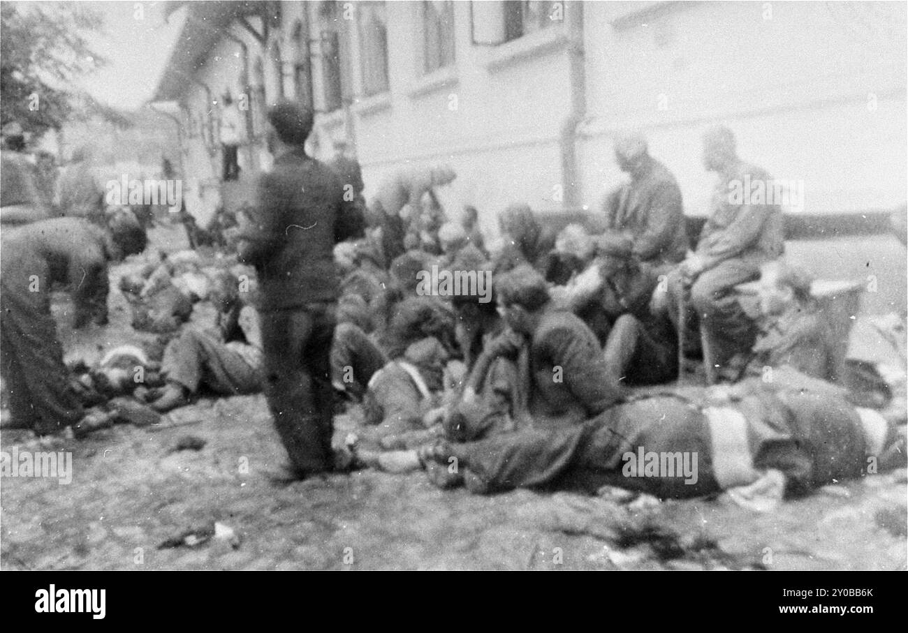 Jews assemble in the courtyard of police headquarters, where many were ...