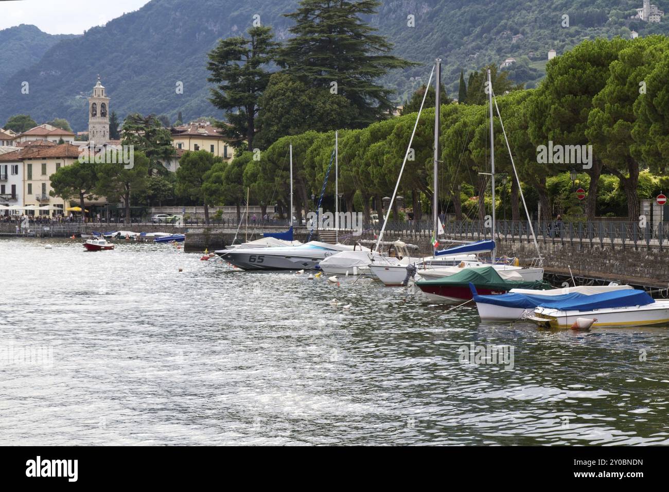 The small boat harbour of the village of Colonno on Lake Como, Italy ...