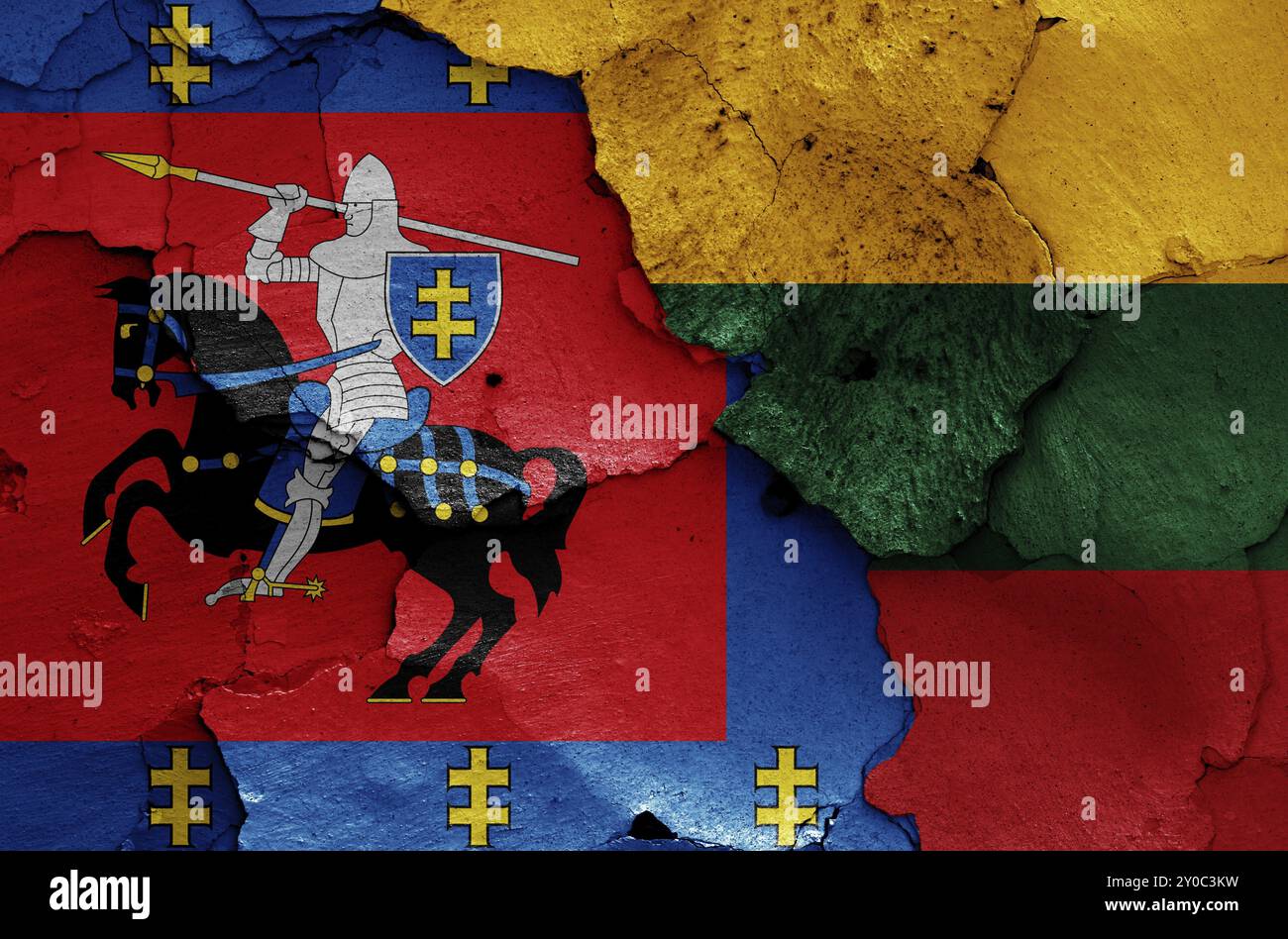 Flags of Vilnius County and Lithuania painted on cracked wall Stock Photo
