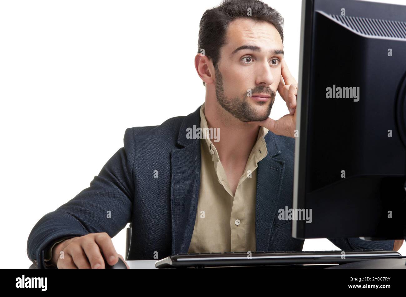 Surprised man looking computer screen hi-res stock photography and ...