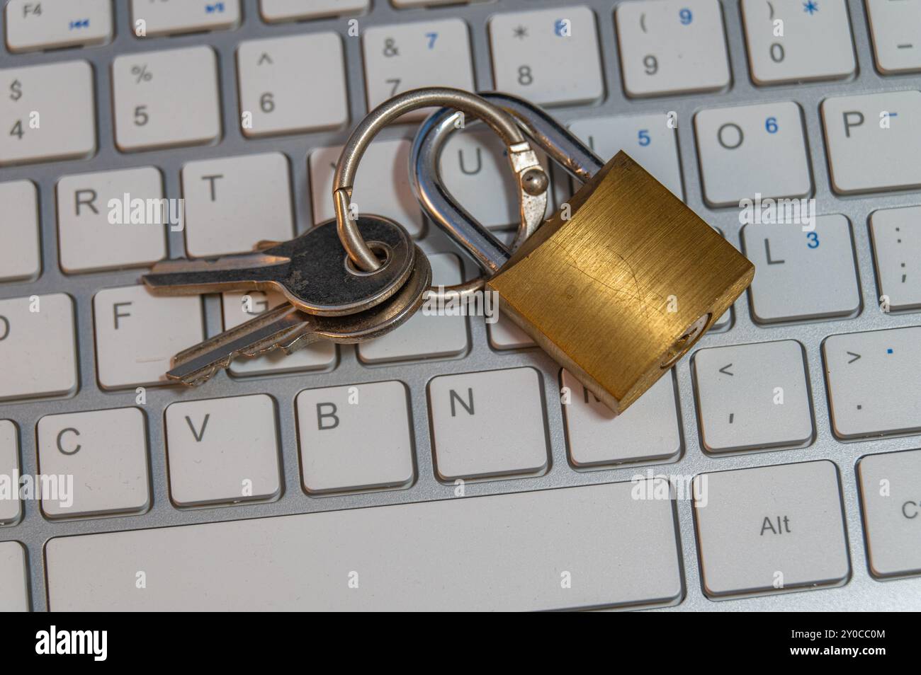 Padlock on a computer keyboard, cybersecurity Stock Photo