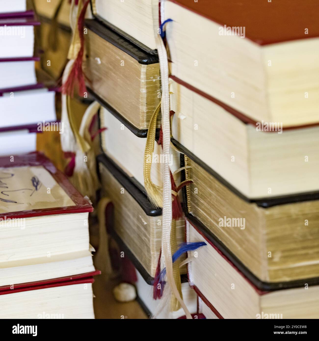 Stack of hymn books in a church Stock Photo