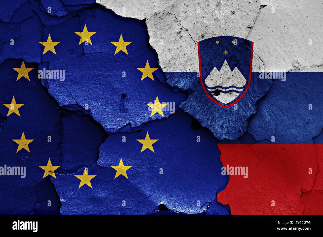 Flags of EU and Slovenia painted on cracked wall Stock Photo - Alamy