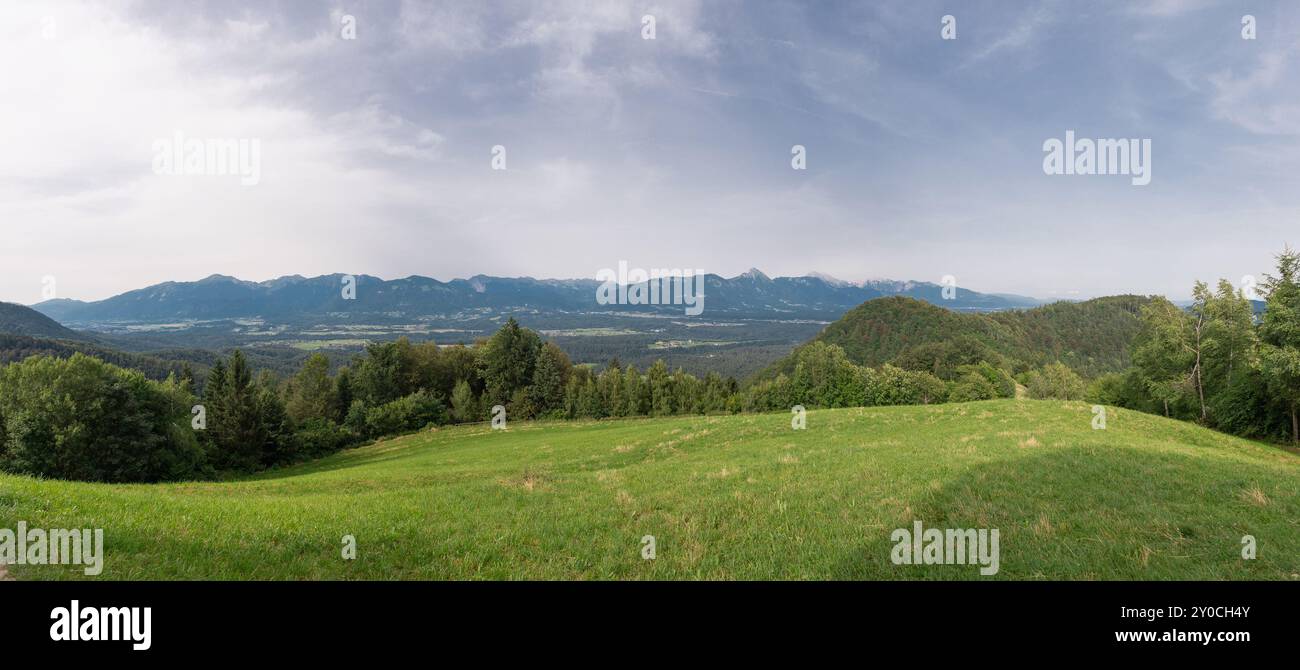 Wide panorama of the karawanken alps from the magical Jamnik church ...