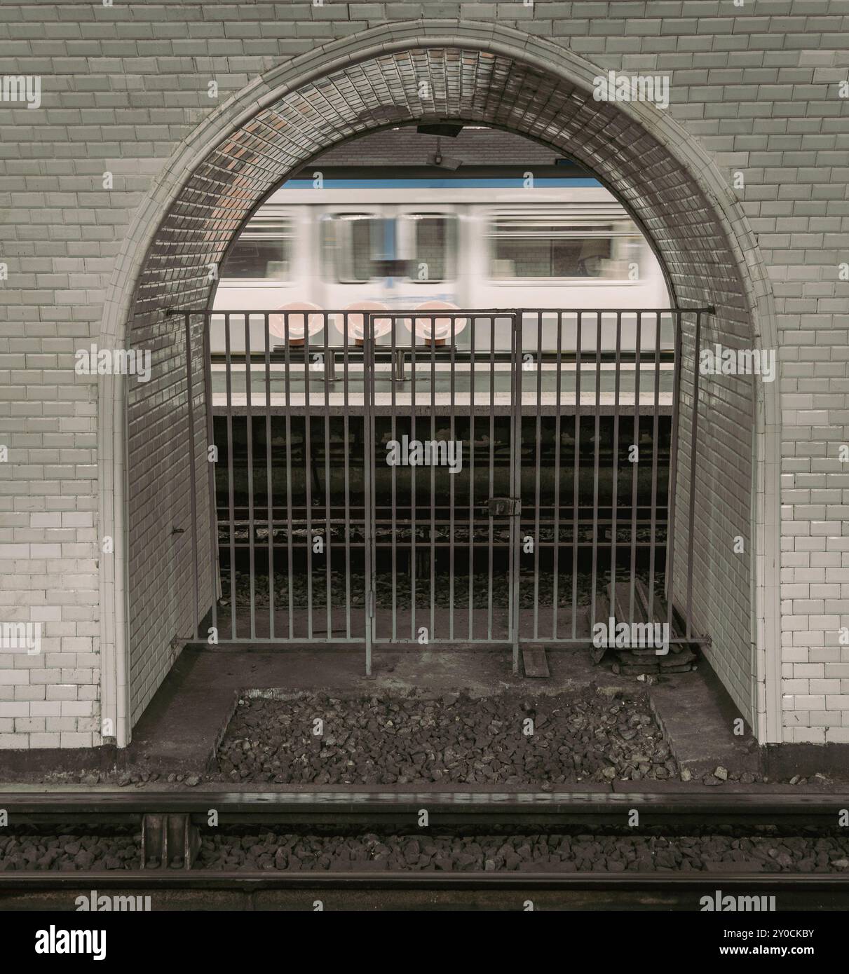 Metro in Paris, visible underground line in paris, with arched window ...