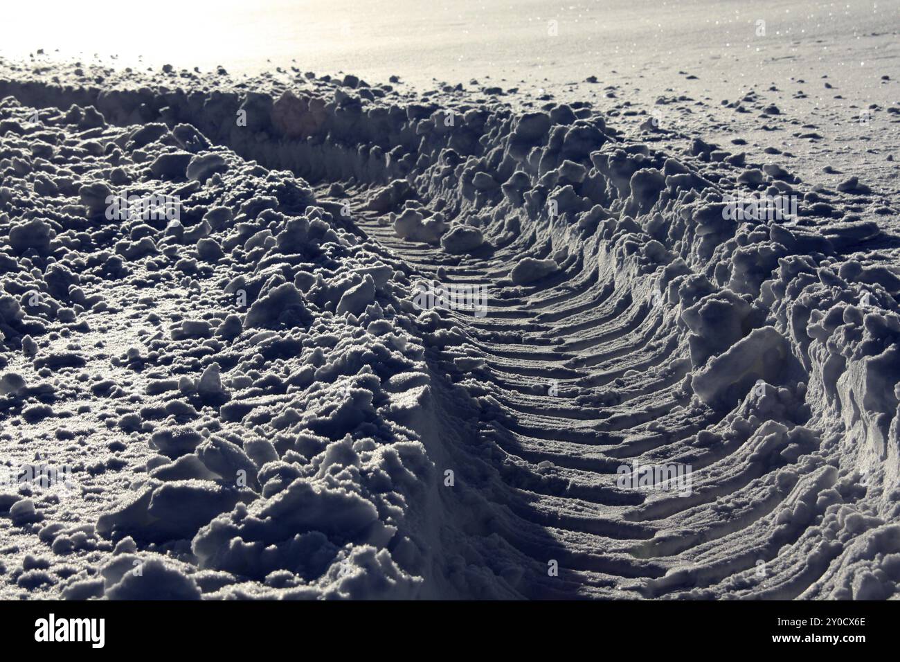 Tyre track in deep snow Stock Photo - Alamy