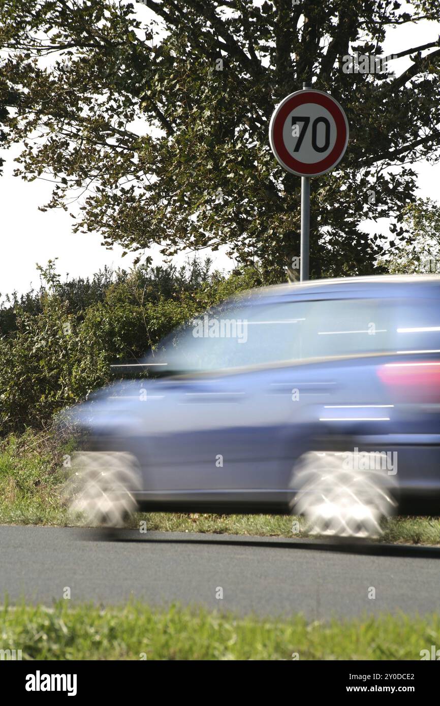 Speeding in front of a 70 km/h sign Stock Photo - Alamy