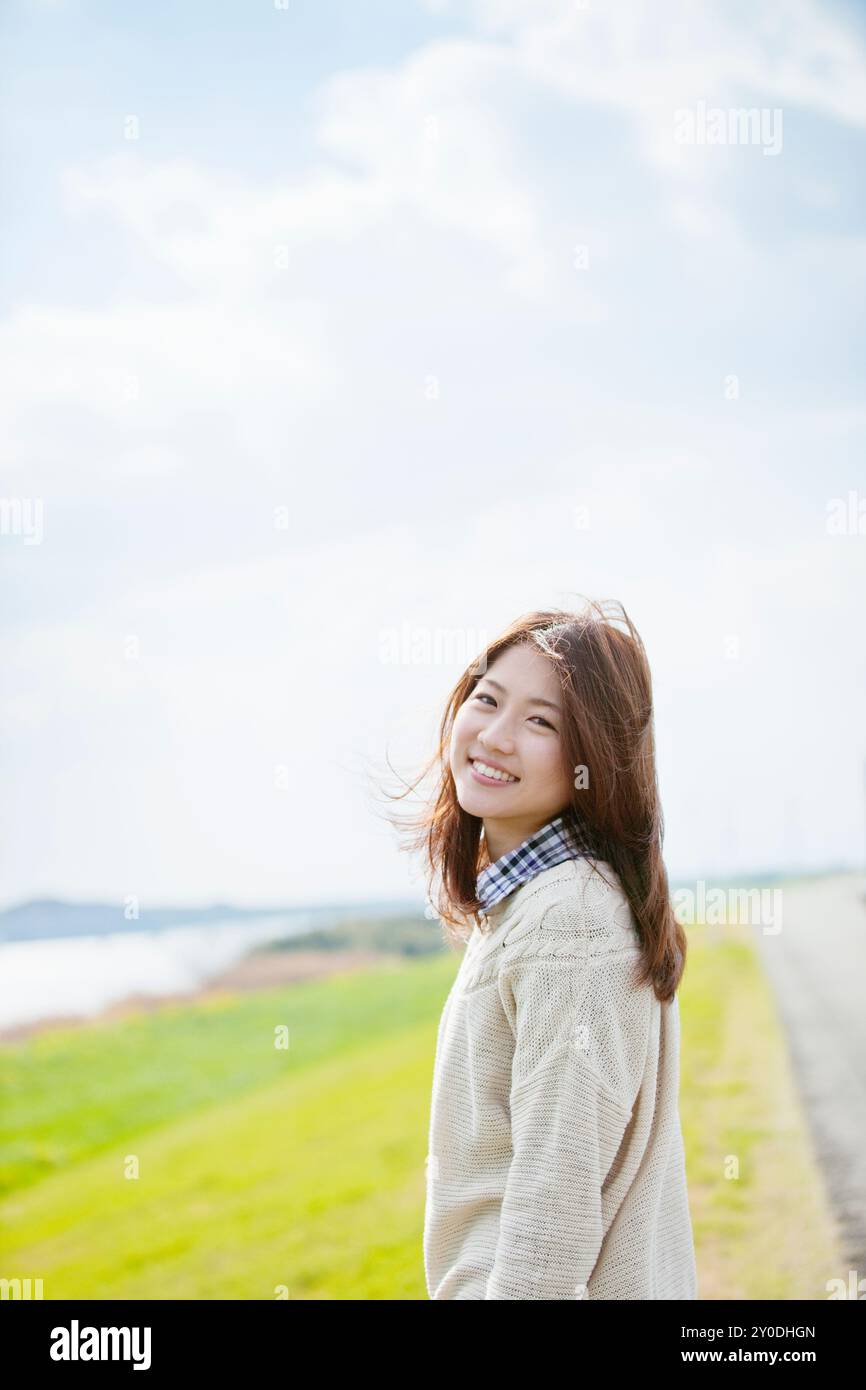 A smiling woman in her 20s Stock Photo - Alamy