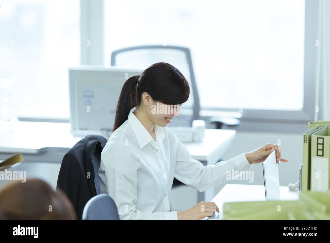 A businesswoman doing deskwork Stock Photo