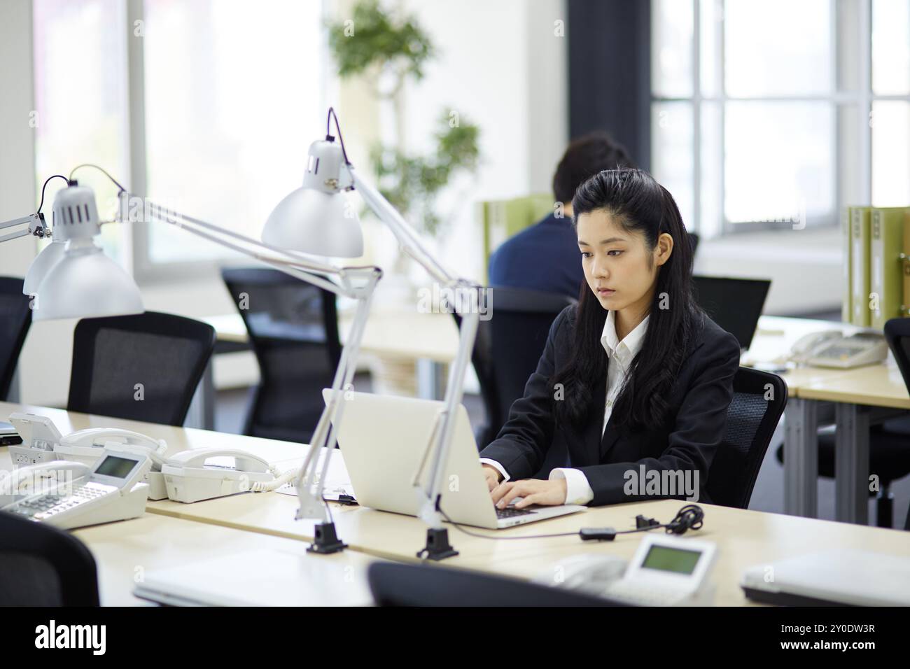 A businesswoman doing deskwork Stock Photo