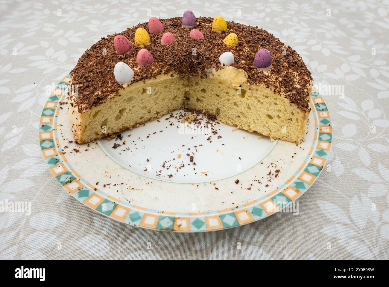 an Easter sponge cake with mini chocolate eggs for decoration Stock Photo