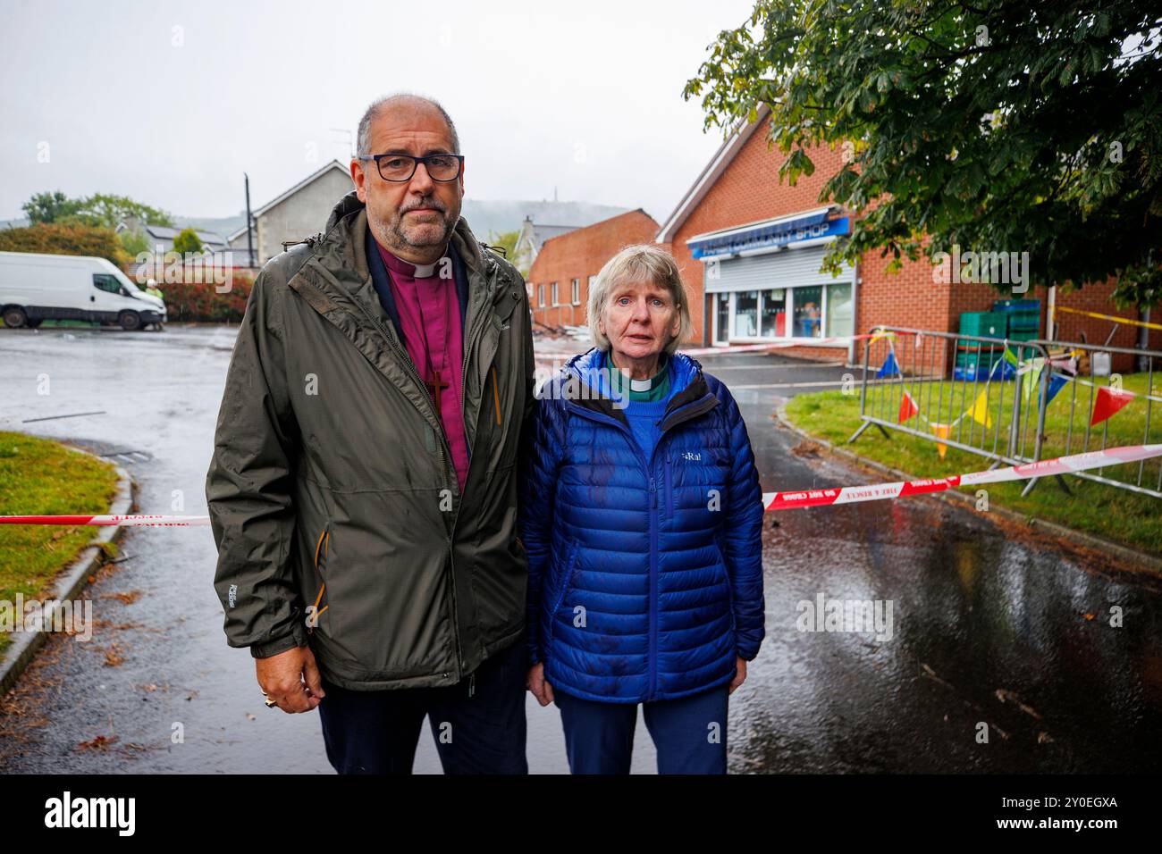 Bishop of Connor the Rev George Davison and Rev Isobel Hawthorne-Steele at the Church of the Holy Name in Greenisland, Co Antrim, following a fire which started on Sunday night, causing significant damage to the Church of Ireland building and hall. The PSNI is treating the incident as arson. Picture date: Monday September 2, 2024. Stock Photo