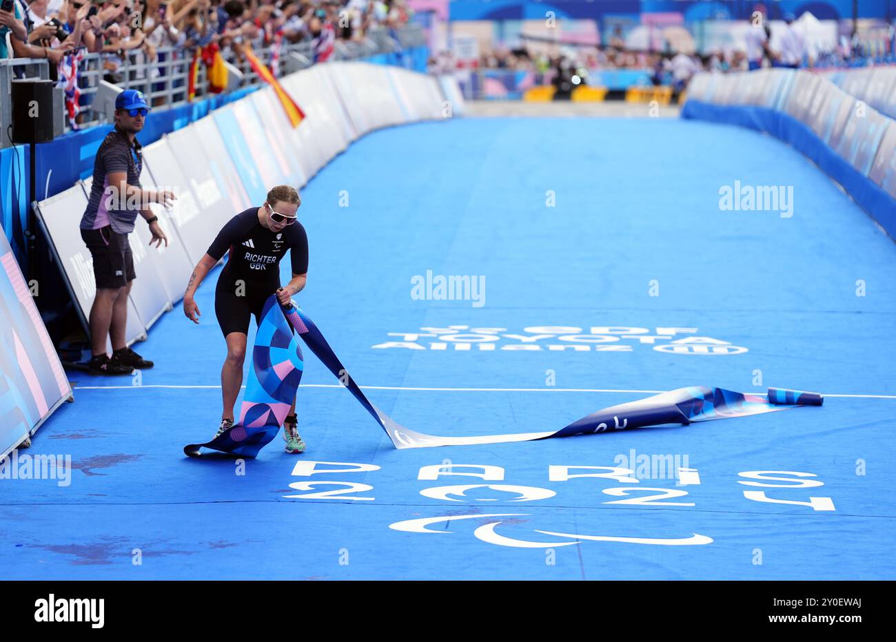 Great Britain's Megan Richter crosses the line to win the Women's PTS4