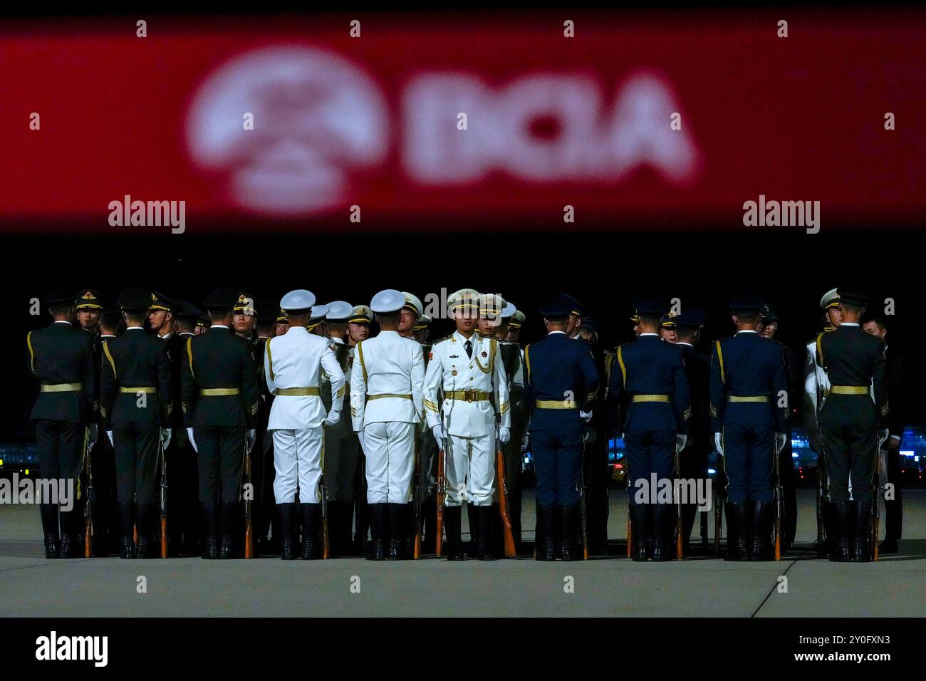 Chinese honor guard stand in formation as they prepare to welcome Kenya ...