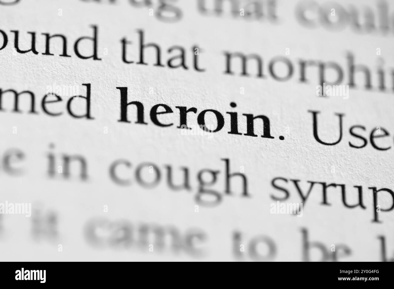 Closeup of Psychology Textbook Word 'Heroin' Stock Photo