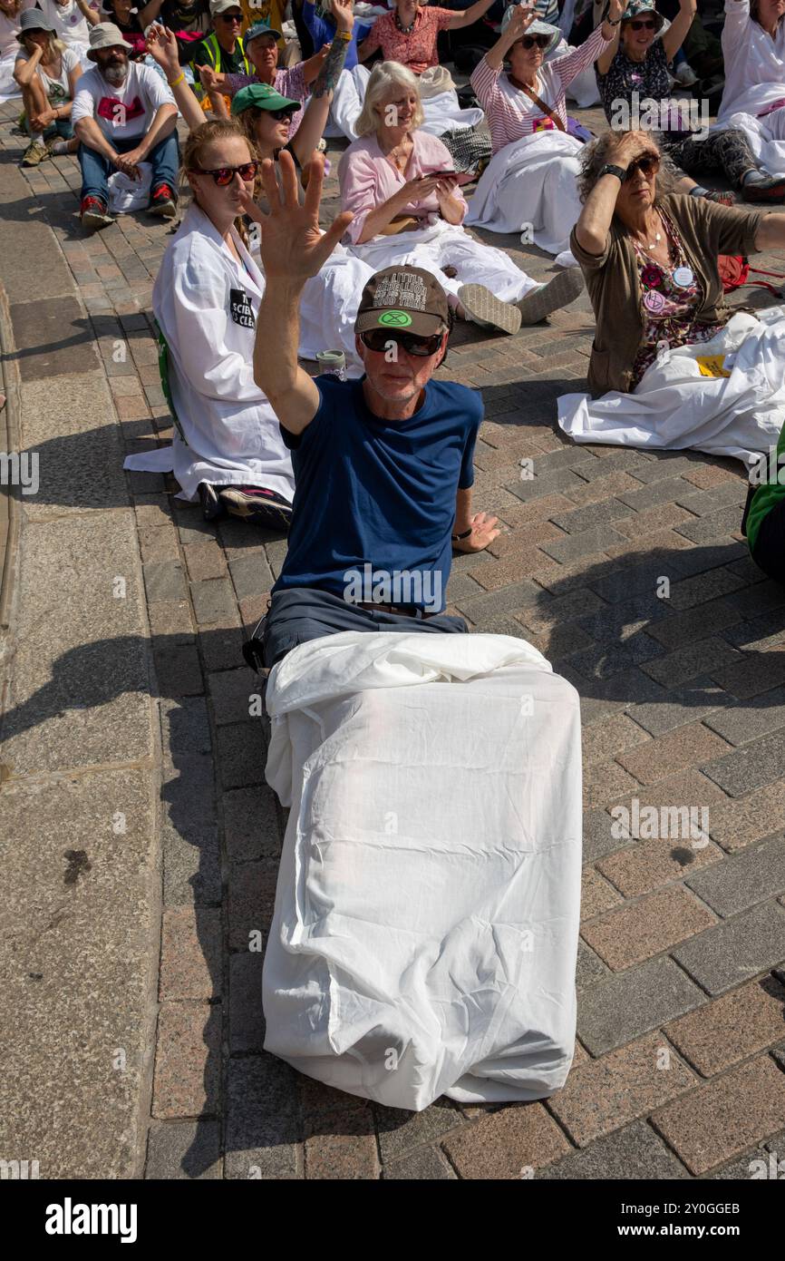 Three members extinction rebellion hi-res stock photography and images ...