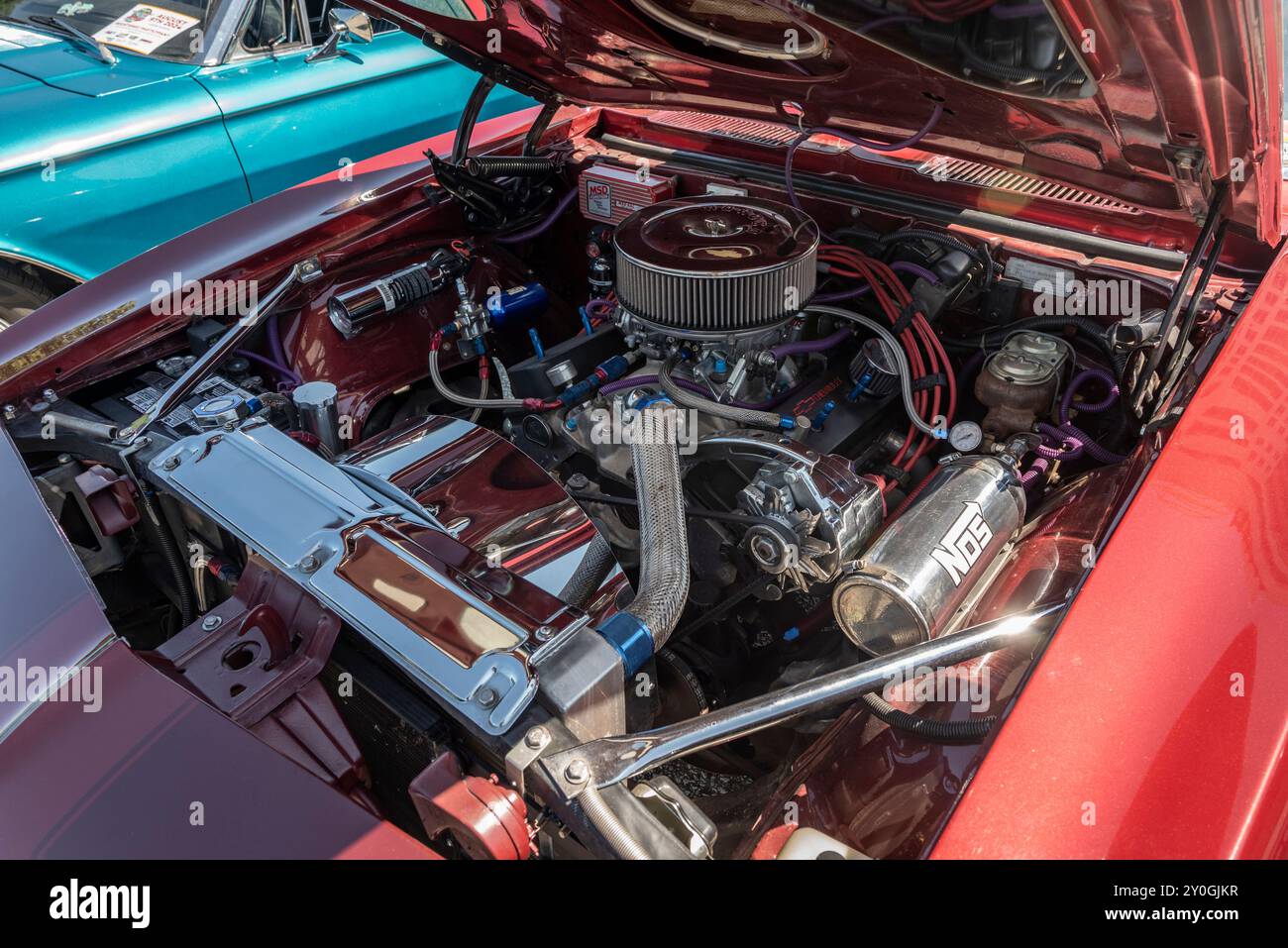 The Classic Camaro RS engine, often a 327 cubic-inch V8, is renowned for its blend of classic American muscle performance and distinctive styling. Stock Photo