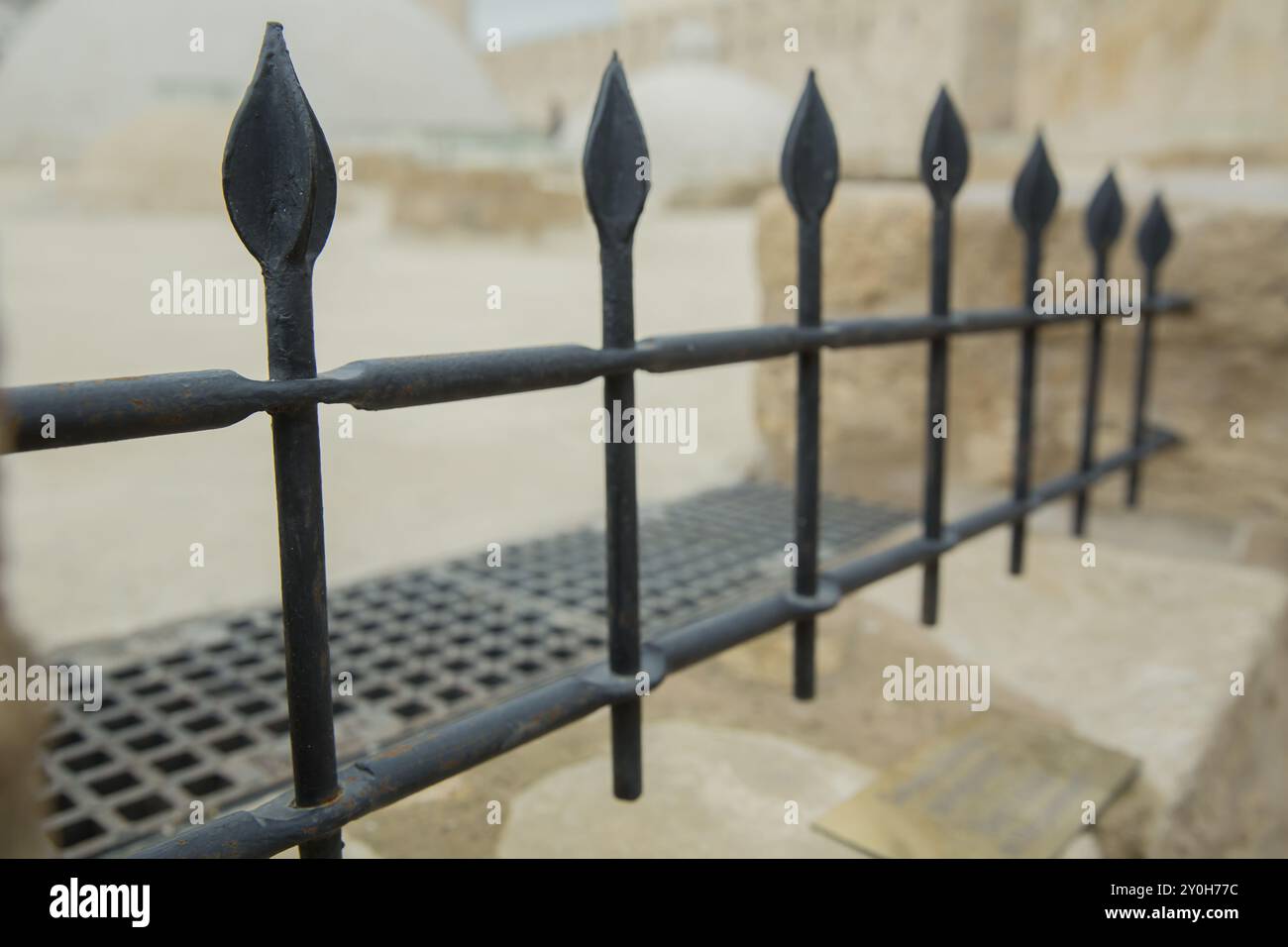Sharp Metal Railing Black railing with sharp spikey tops to prevent climbing . Jagged iron ...