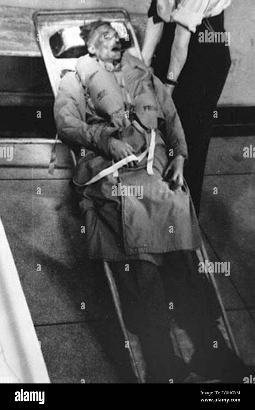 The corpse of Glyndwr Michael, dressed as Martin, just prior to ...